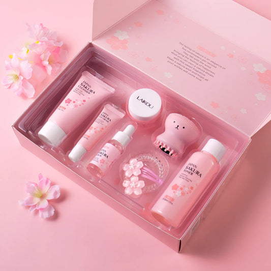 Conjunto de 8 peças de cuidados com a pele Sakura: Limpador facial, tônico, essência, creme para os olhos, creme essência, presilha de cabelo, elástico de cabelo, polvo rosa.